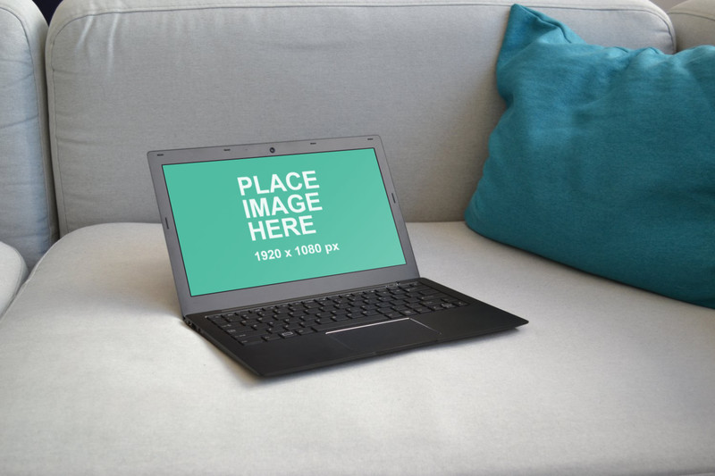 PC laptop on sofa