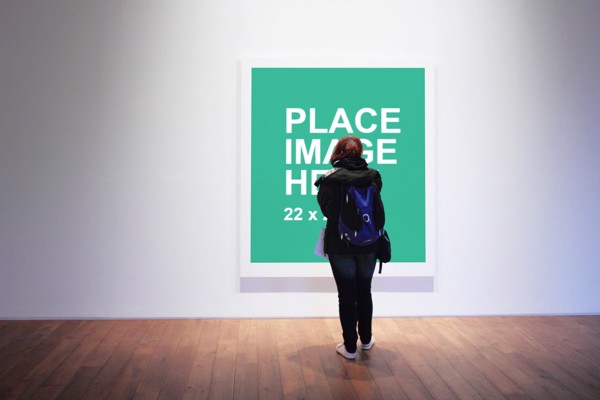 Woman looking at art