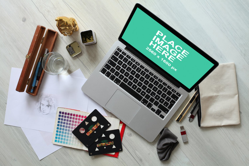 Macbook Pro on creative table