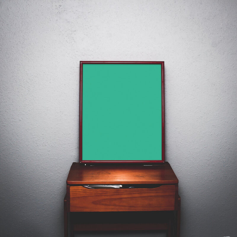 Picture frame on cabinet