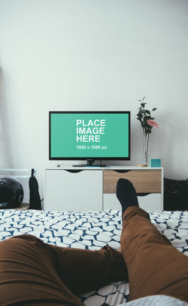 Watching TV in bedroom