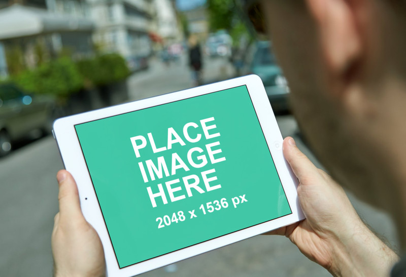 White iPad 4 on street