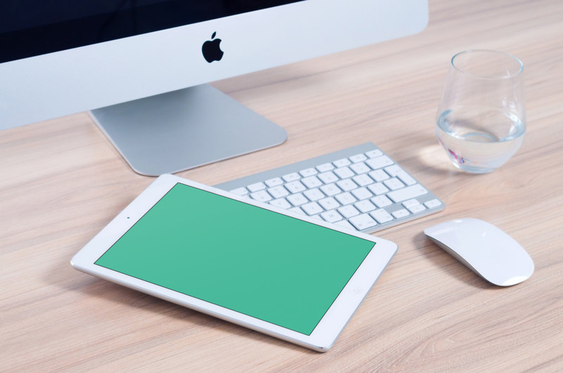 White iPad and iMac on desk