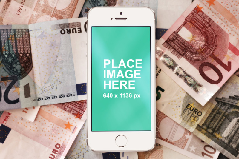 White iPhone 5 with money background
