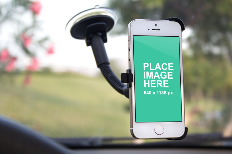 White iPhone 5s in car
