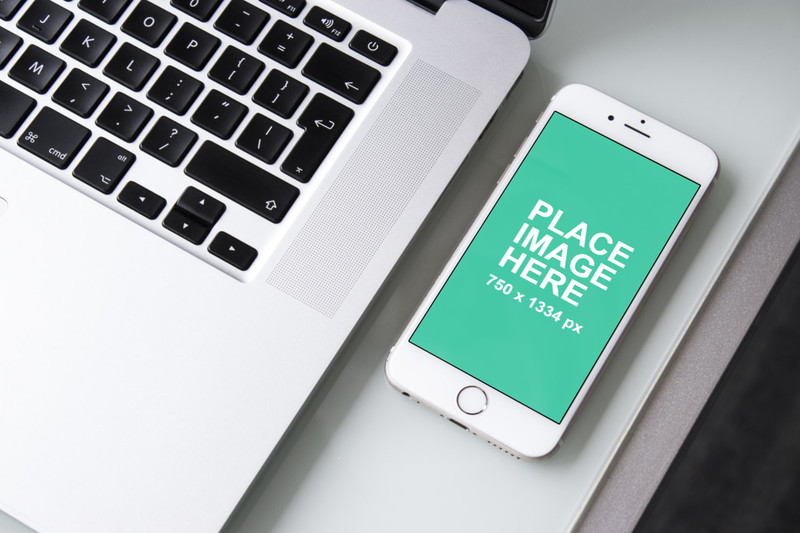 White iPhone 6 with Macbook Pro