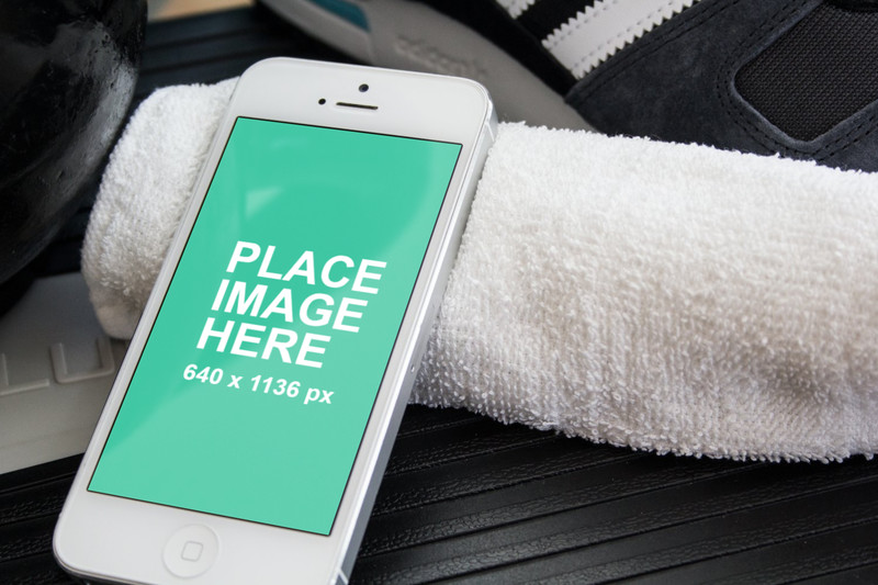 White iPhone on towel