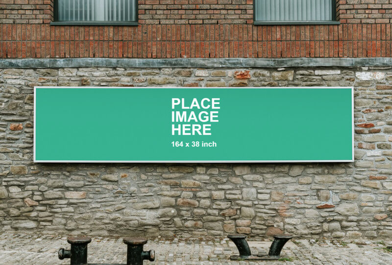 Long sign on stone wall