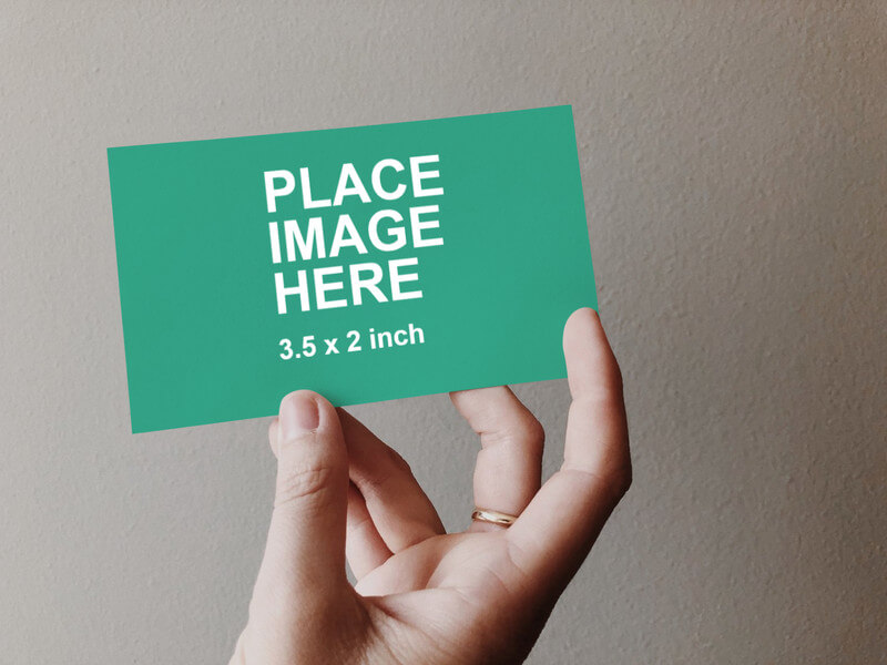 Woman holding card
