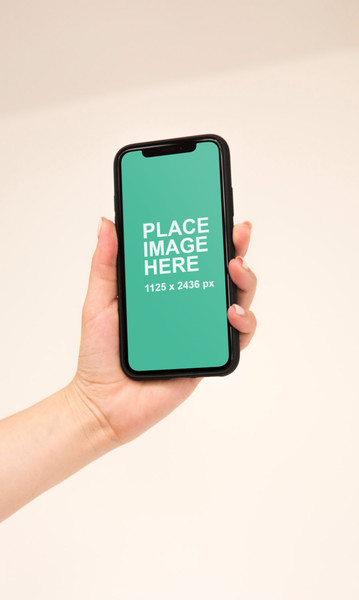 Woman holding iPhone X