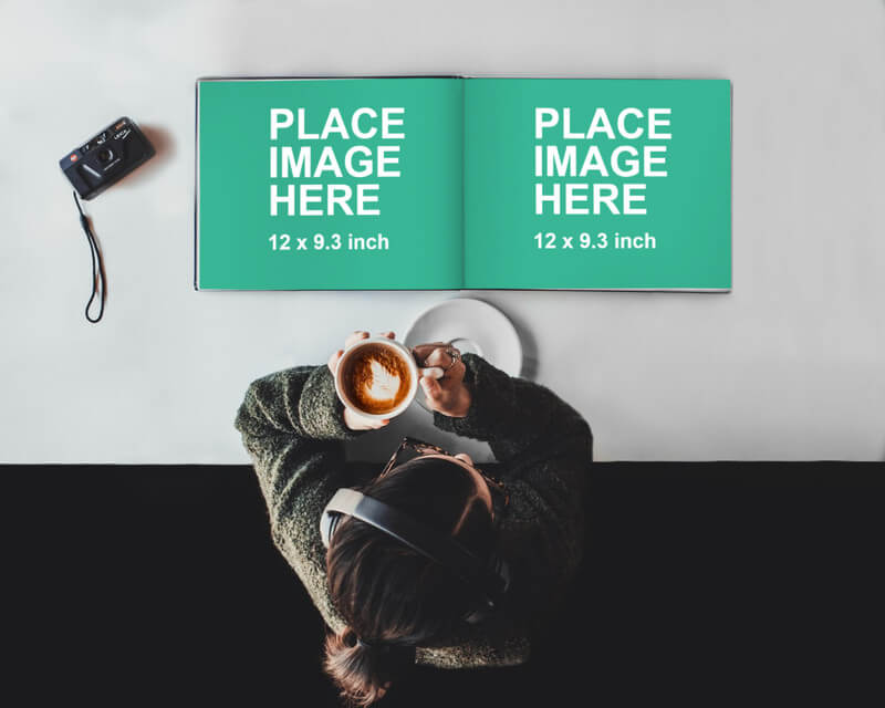 Woman reading coffee table book
