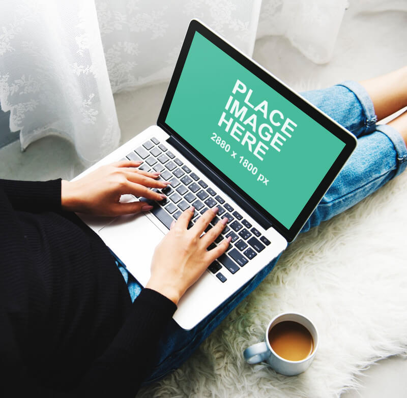 Woman using MacBook Pro