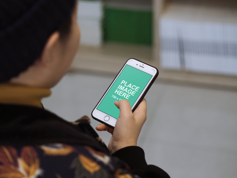 Woman using white iPhone