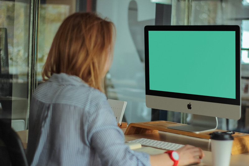 Woman working on iMac