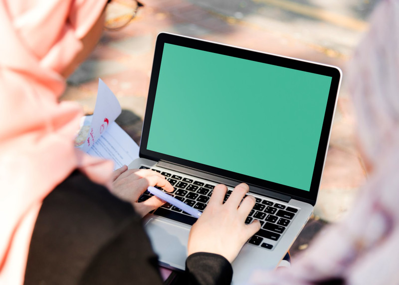 Woman working on MacBook Pro